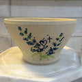 Handcrafted Pottery Bowl with Blue Floral Design